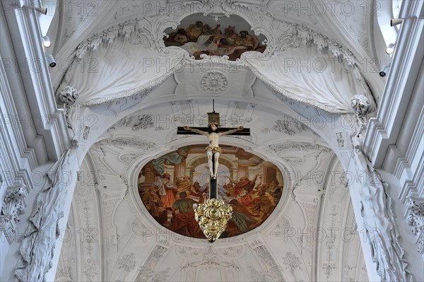 In the Neumuenster collegiate monastery, Wuerzburg, depiction of the crucifixion of Christ under a