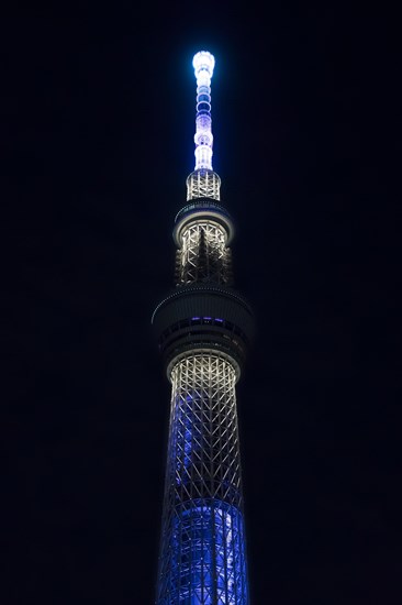 634 meters high Tokyo Skytree, broadcasting and observation tower in Sumida illuminated at night in