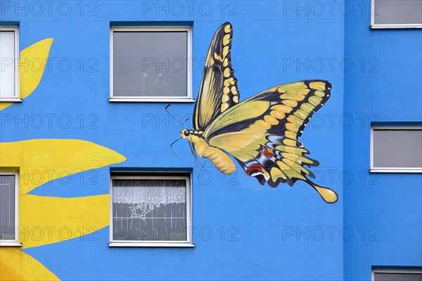 Sunflower house, painted swallowtail butterfly on a skyscraper, artist Ulrich Allgaier, Wuppertal,
