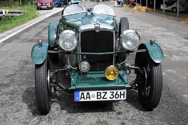 Morris 8, A detailed green vintage car with yellow headlights, SOLITUDE REVIVAL 2011, Stuttgart,