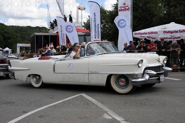 A white classic convertible saloon during a demonstration drive on a race track, SOLITUDE REVIVAL