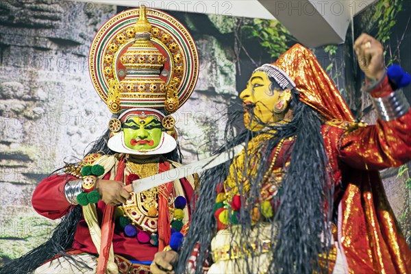 Kathakali performer or mime, 38 and 60 years old, on stage at the Kochi Kathakali Centre, Kochi,