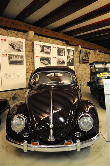 German Car Museum Langenburg, Black Volkswagen Beetle in a historic museum setting, German Car