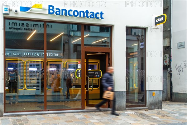Indoor ATM cash dispenser of bank neutral Bancontact CASH point in shopping street in the city