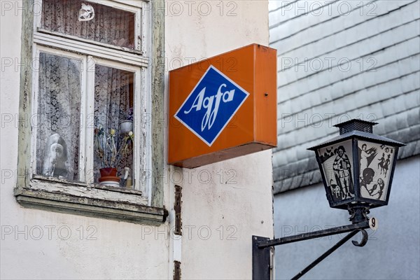 Cantilever sign, AGFA Film und Foto advertising sign, light box, abandoned photo shop, old window,