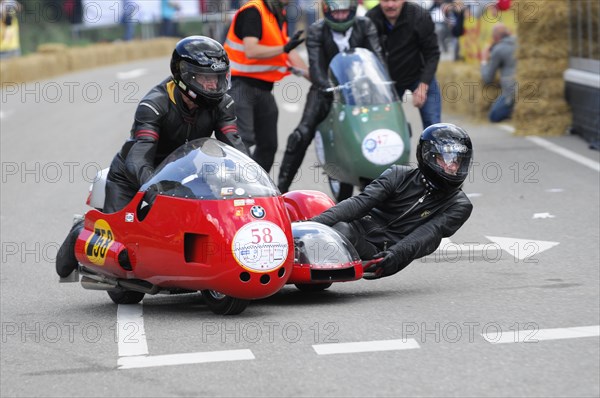 Team in a red sidecar motorbike during a race, SOLITUDE REVIVAL 2011, Stuttgart,