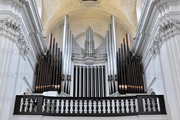 The organ in the Neumuenster collegiate monastery, Wuerzburg, close-up of an organ with many pipes