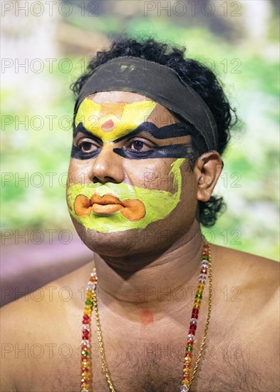 Kathakali performer or mime, 38 years old, with painted face, Kochi Kathakali Centre, Kochi,