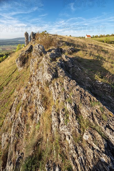 Evening on the Ehrenbuerg witness mountain, also known as Walberla, with Walburgis Chapel and
