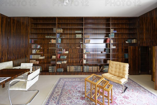 Interior view, book wall, living room, Villa Tugendhat (architect Ludwig Mies van der Rohe, UNESCO