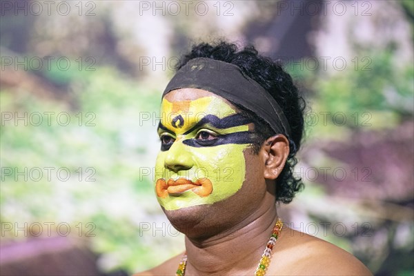 Kathakali performer or mime, 38 years old, with painted face, Kochi Kathakali Centre, Kochi,