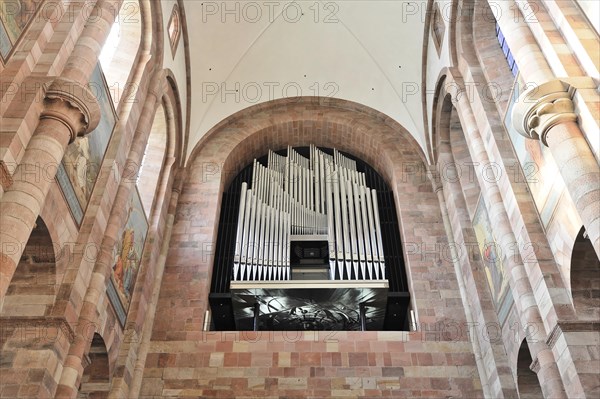 Speyer Cathedral, view of a church organ from the inside with many organ pipes and arches, Speyer