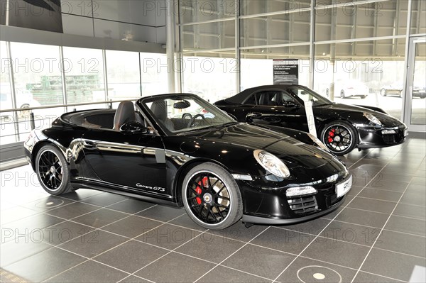 A Porsche Cayman GT3 Coupe presented at the dealership, Schwaebisch Gmuend, Baden-Wuerttemberg,