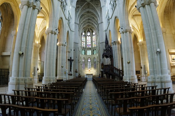 Church of Saint-Vincent-de-Paul, interior view of a church with rows of columns, pews and light