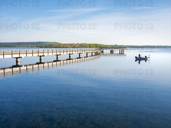 Pier in the harbour and fishing boat, Braunsbedra Marina, Geiseltalsee, Saxony-Anhalt, Germany,