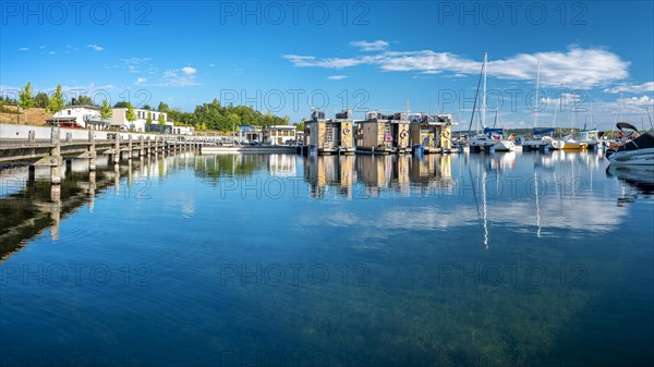 Holiday homes, sailing boats and houseboats in the harbour, Marina Braunsbedra, Geiseltalsee,