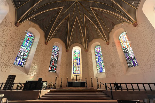 Speyer Cathedral, view of the altar area of a church with pews and special ceiling structure,