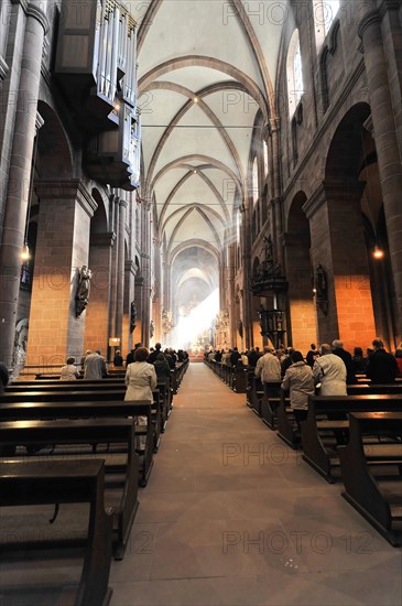 Speyer Cathedral, worshippers sitting on benches inside Worms Cathedral, Speyer Cathedral, Unesco
