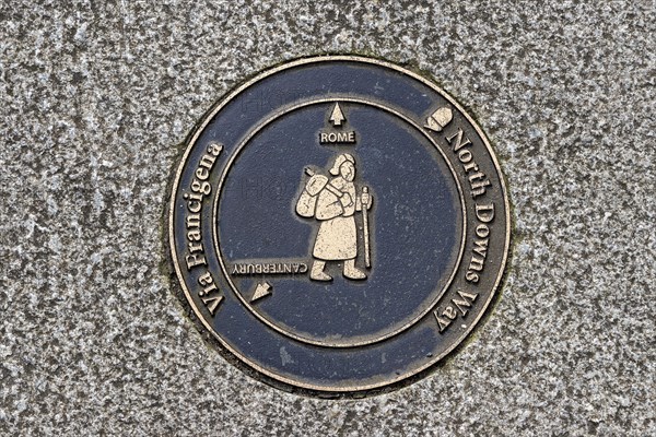 Plaque in the pavement showing the route of the Pilgrims' Way from Canterbury to Rome, North Downs