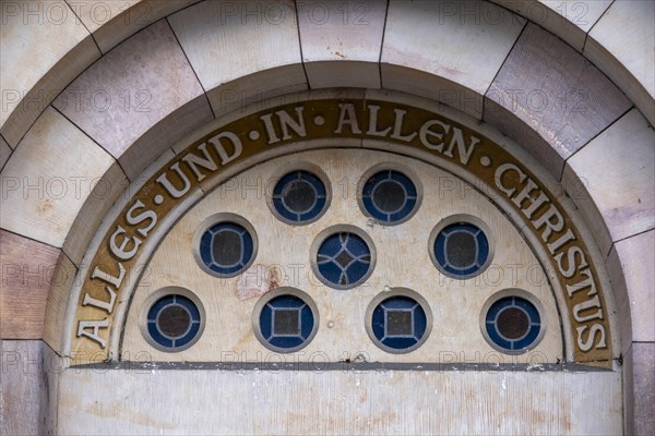 Slogan All and in all Christ above a door of St Mary's Cathedral, Havelberg, Saxony-Anhalt,