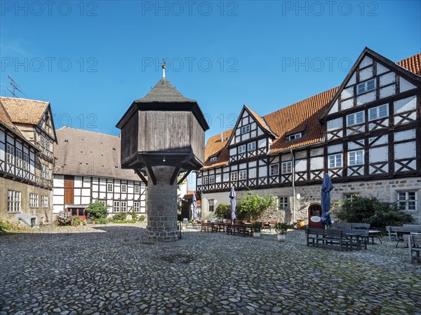 Half-timbered houses and dovecote in the Quedlinburg Adelshof in the historic old town, UNESCO