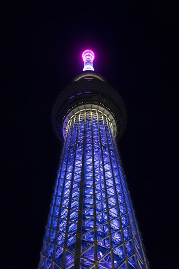 634 meters high Tokyo Skytree, broadcasting and observation tower in Sumida illuminated at night in