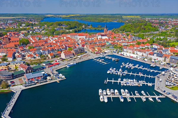 Aerial view over Waren, town and climatic spa on the shores of Lake Mueritz in summer,