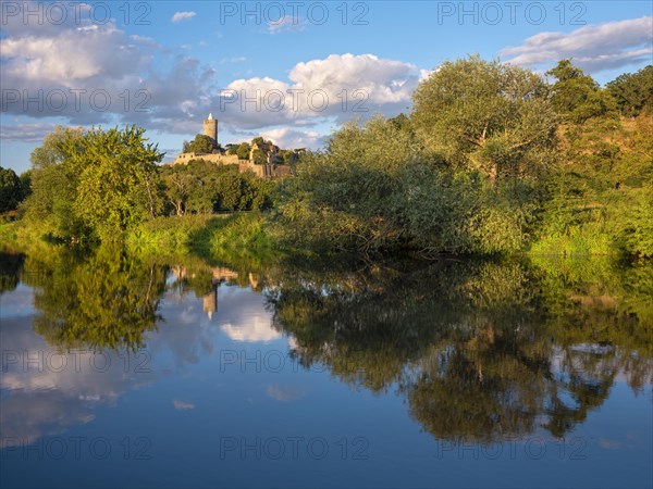 Schoenburg Castle in the Saale valley in the evening light, reflection in the river Saale,