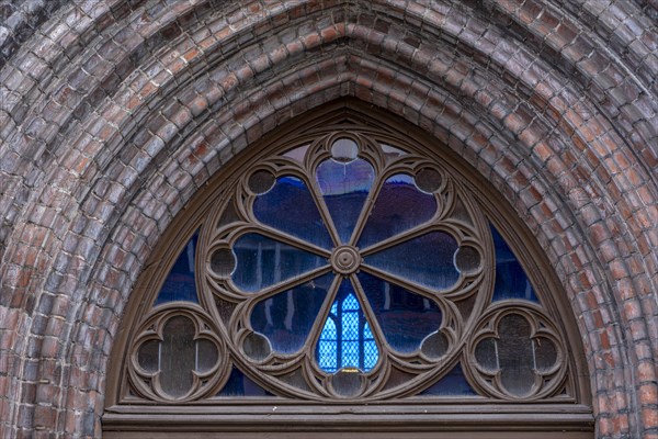 View through a church window into the parish church of St Laurentius, Havelberg, Saxony-Anhalt,