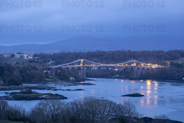 Menai Suspension Bridge in the evening, Menai Strait, LLanfair Pwllgwyngyll, Isle of Anglesey,