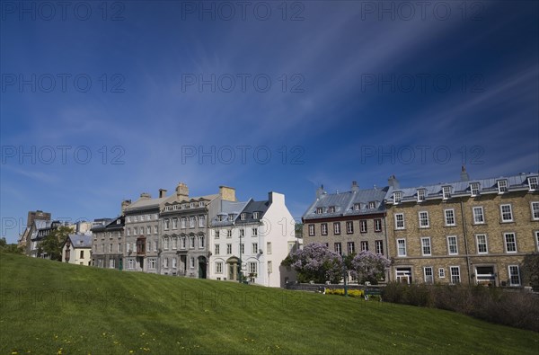 Old historical architectural residential buildings on Saint-Denis avenue in Upper Town and sloped
