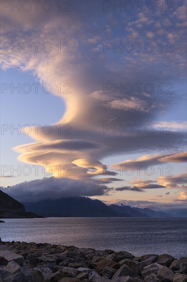 Cloudscape, view from Hamnoy over the sea along Moskenesoya, Flakstadoya and Vestvagoya. Several