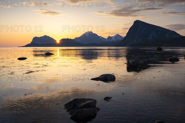 Landscape on the Lofoten Islands. View from Flakstadoya to Vestvagoya with the snow-covered