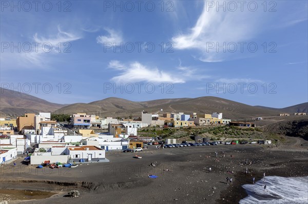 View of the fishing village Puerto de La Pena with the beach Playa de los Muertos, Ajuy, west
