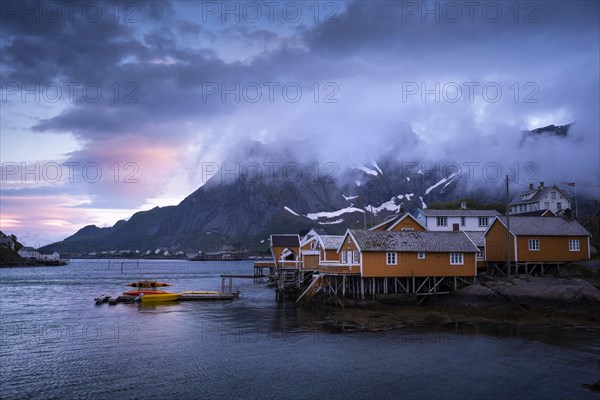 The village of Sakrisoy with its typical yellow or ochre-coloured wooden houses on wooden stilts