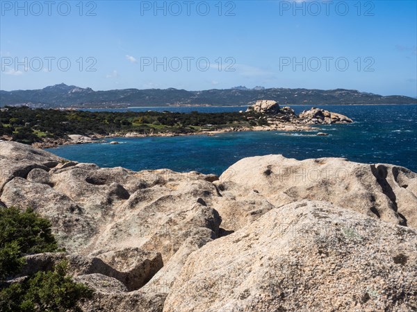 Typical granite rock formations in front of a bay, Baja Sardinia, Costa Smeralda, Sardinia, Italy,