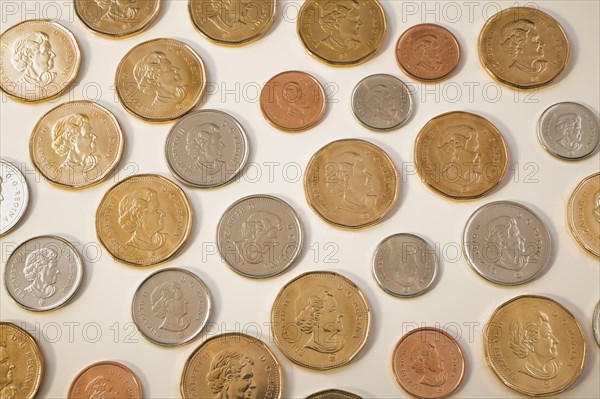 Portrait of Queen Elizabeth II on Canadian one dollar, twenty five, ten, five and one cent coins on
