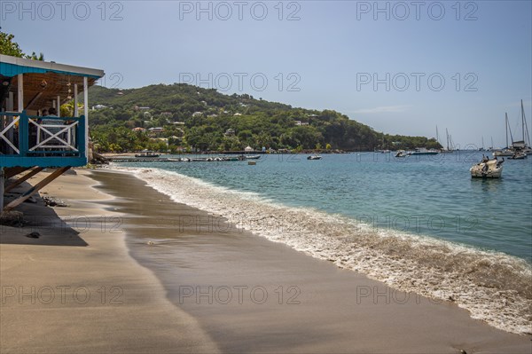 A beach in the Caribbean on the Atlantic coast in Deshaies, Guadeloupe, French Antilles, North