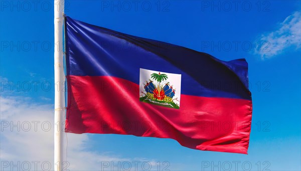 Flags, the national flag of Haiti flutters in the wind