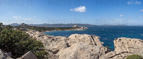 Typical granite rock formations in front of a bay, Baja Sardinia, Costa Smeralda, Sardinia, Italy,