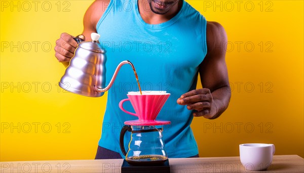 Muscular male person in a tank top making coffee against a yellow wall, adding to fitness routine,