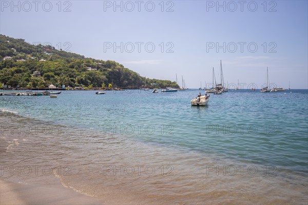 A beach in the Caribbean on the Atlantic coast in Deshaies, Guadeloupe, French Antilles, North