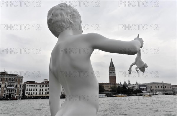 Charles Ray's statue of the boy with a frog on the top of the Zattere, detail of a surrealist