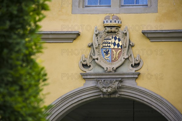 Mythical creature and ducal Wuerttemberg coat of arms above archway, stone figure, face, Winnental