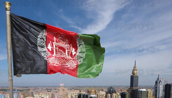 Flag, the national flag of Afghanistan flutters in the wind