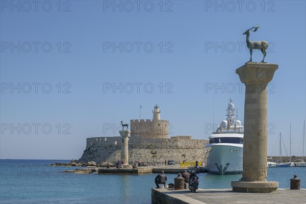 Elafos and Elafina, stag and hind, sculptures on columns, harbour entrance Mandraki harbour,