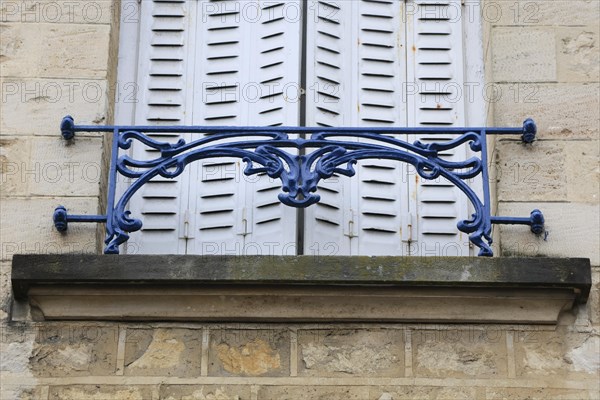 Window railings and balconies on residential buildings designed by Hector Guimard in the Art