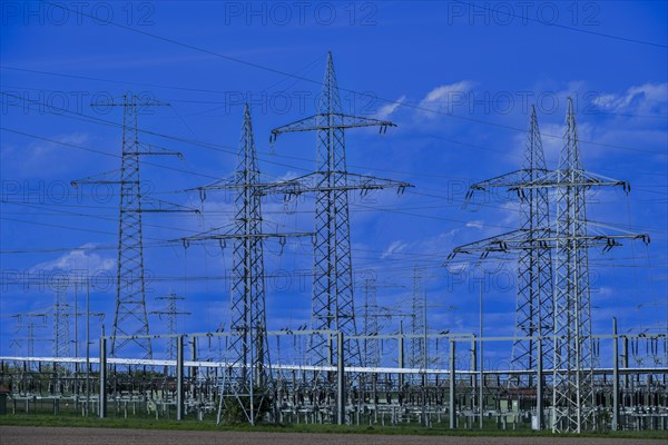 Power pylons with high-voltage lines at the Avacon substation in Helmstedt, Helmstedt, Lower