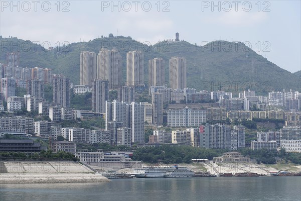 Chongqing, Chongqing Province, The view of an urban riverside landscape with dense development and