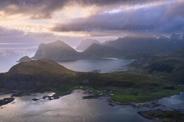 Landscape on the Lofoten Islands. View from the mountain Offersoykammen to the sea, the mountains